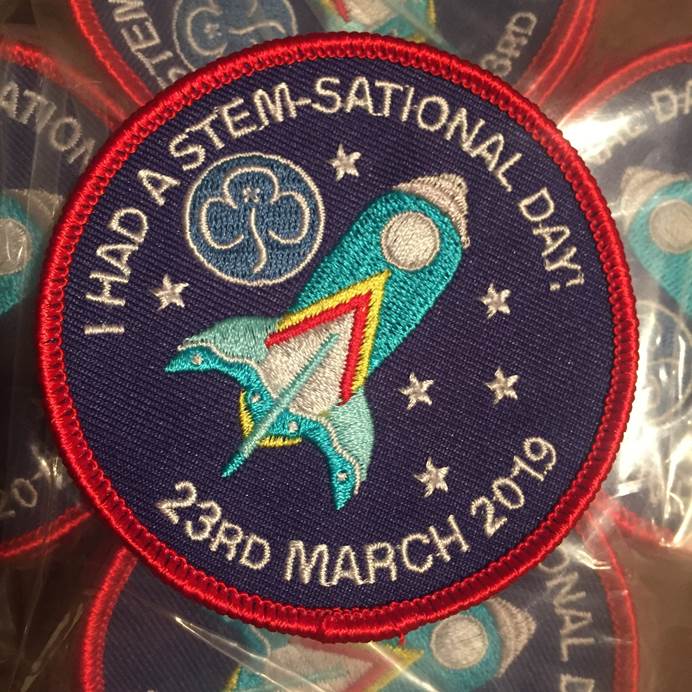 Badge that says 'I had a stem-senational day' and 23rd March 2019. The badge in navy blue and has a rocket and trefoil on it