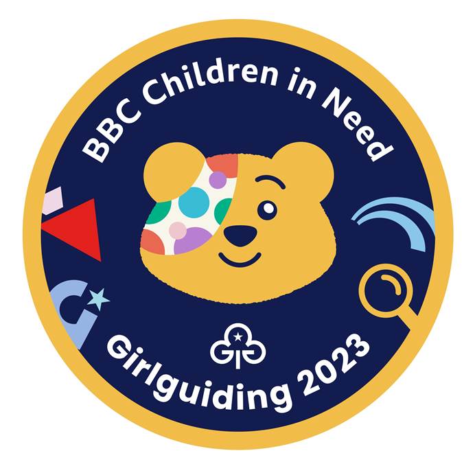 Pudsey face on a dark blue background surrounded by the Rainbow, Brownie, Guide and Ranger logos and the trefoil. It says BBC Children in Need Girlguiding 2023 on it